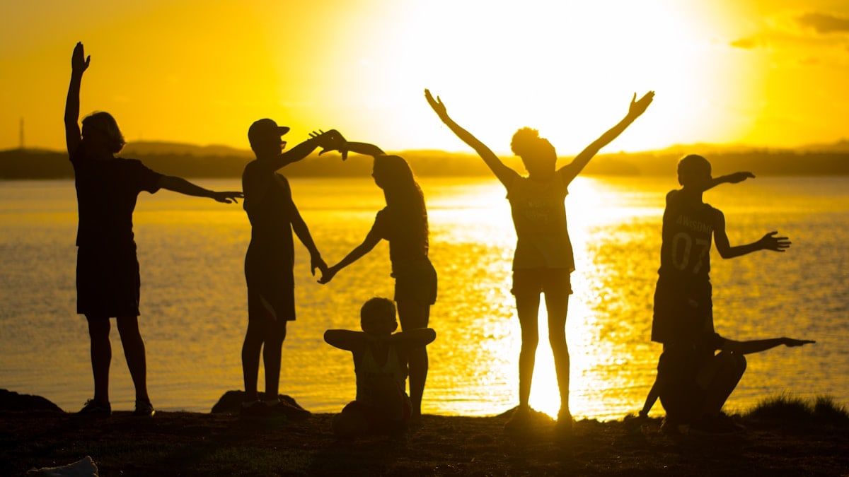 Group of People spelling LOVE